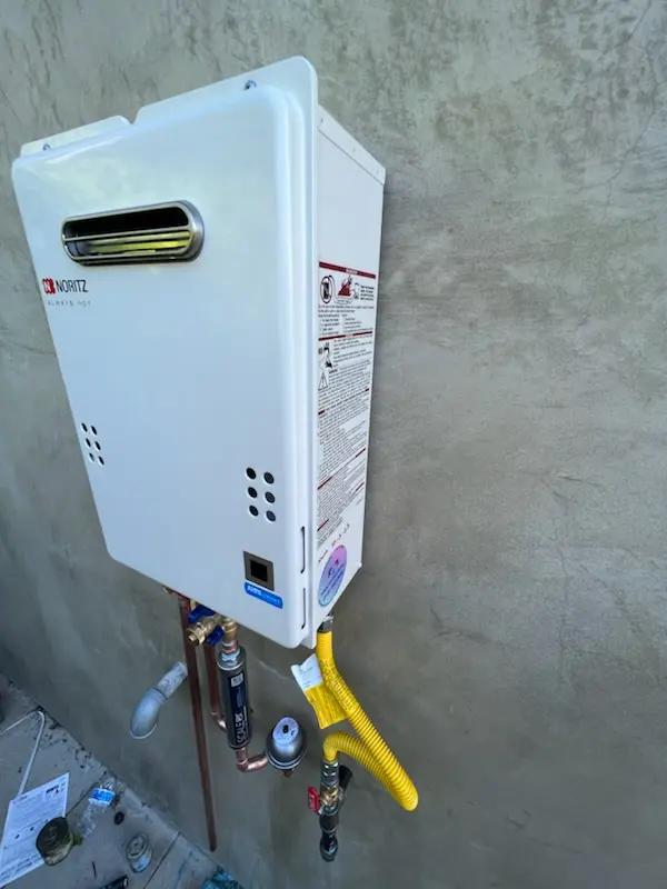 Tankless water heater installation for Woodside Manor homes